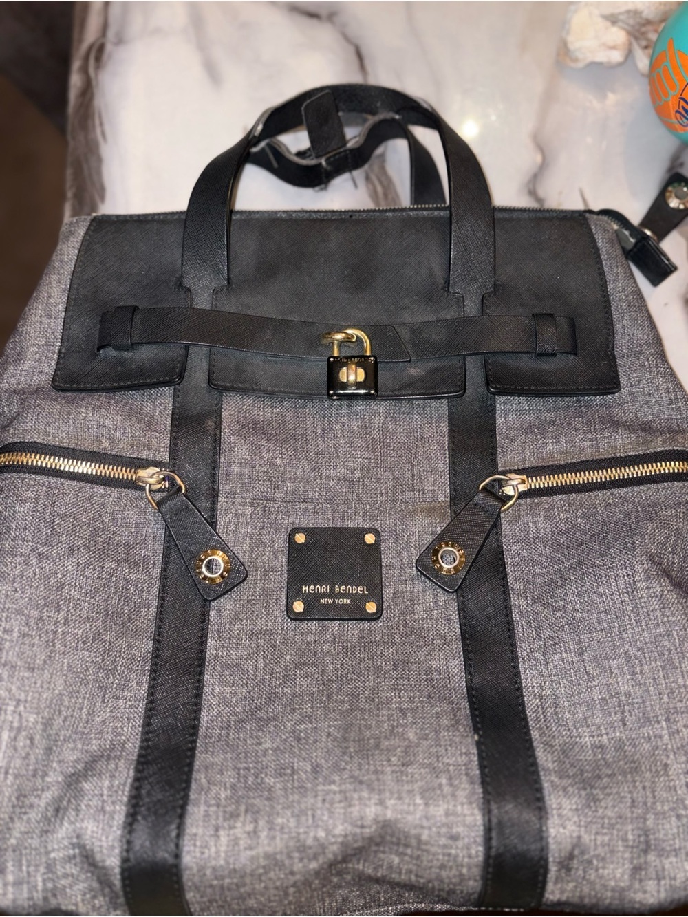 Henri Bendel jetsetter convertible backpack Wearing on the short straps